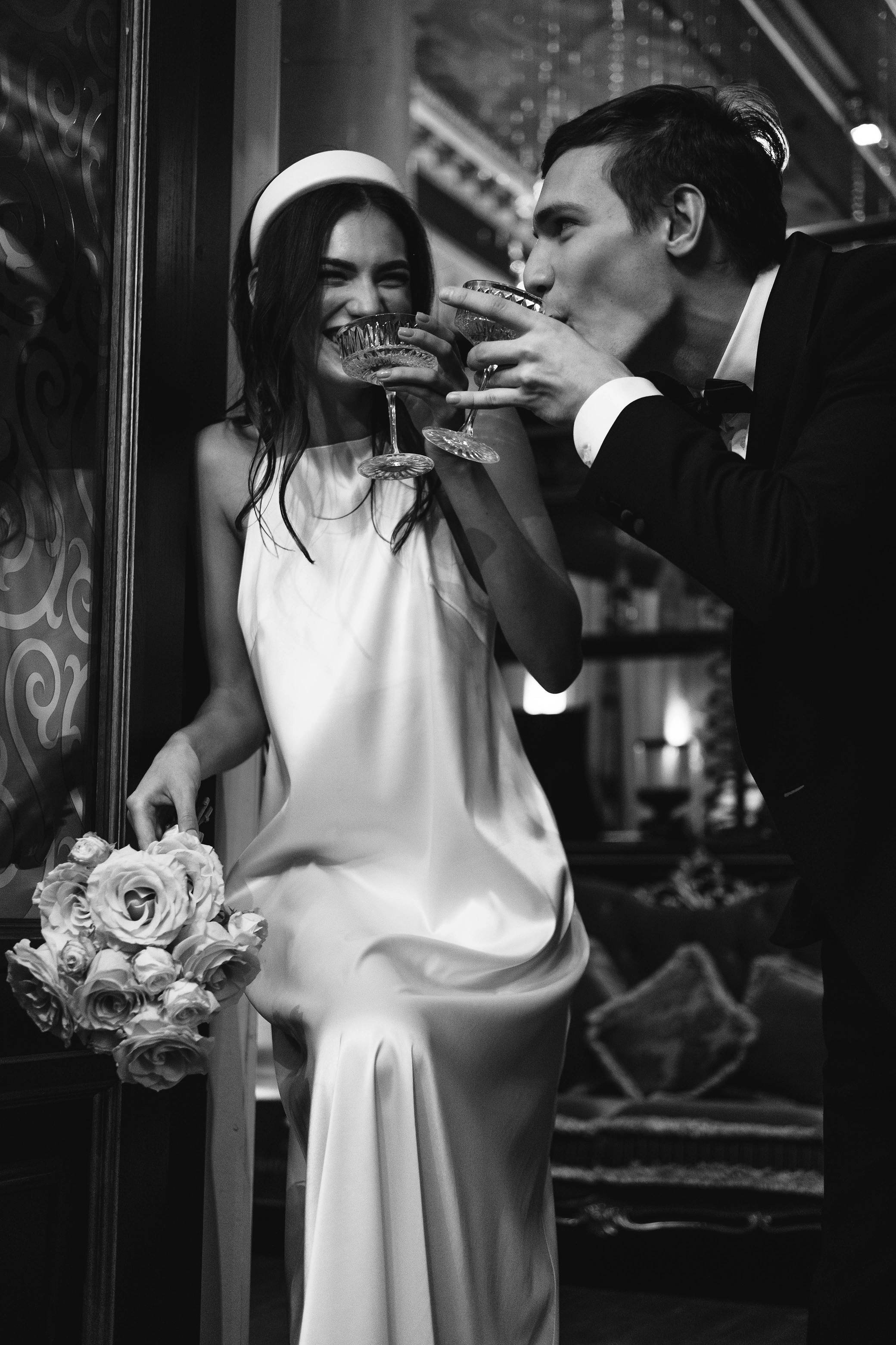 Bride and Groom Drinking Champagne 